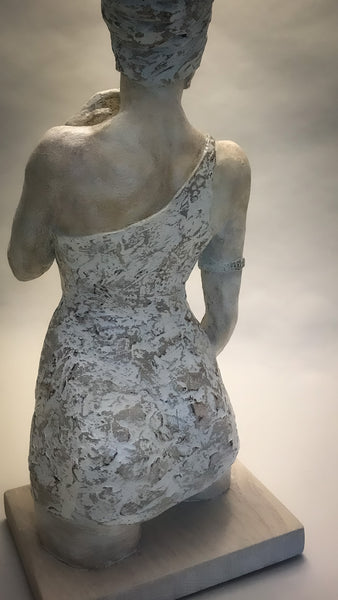 Stoneware | Sculpture | Royal | Elegance | The Empress... Celebrating the beauty, strength, and grace of the feminine one |  Perfect in form | Standing pose | With fingers of right  hand  touching chin | Back view